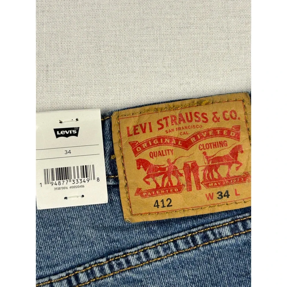 Levis 412 Slim Shorts Mens 34 Blue Denim Cut Off Raw Hem Performance Stretch NEW